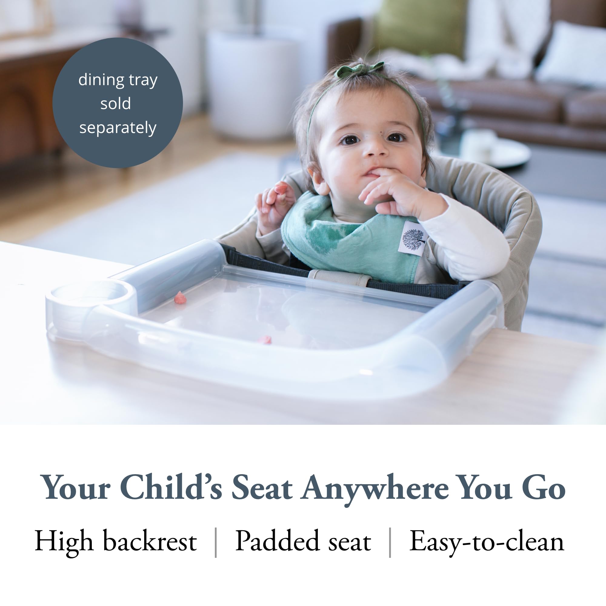 Inglesina Fast Table Chair cream attached to a table demonstrates secure seating for toddlers.