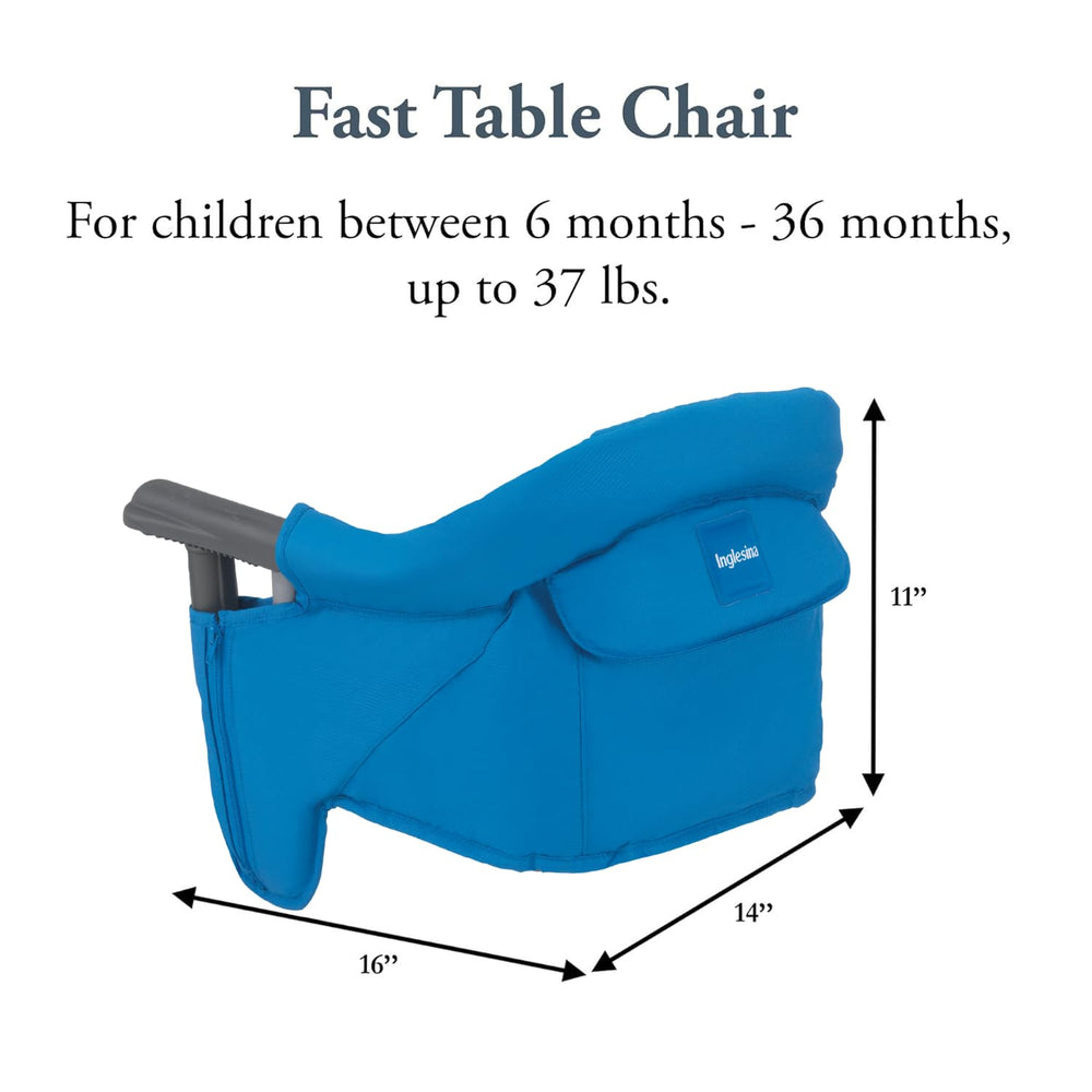 Inglesina Fast Table Chair light blue attached to a table, stable dining setup.