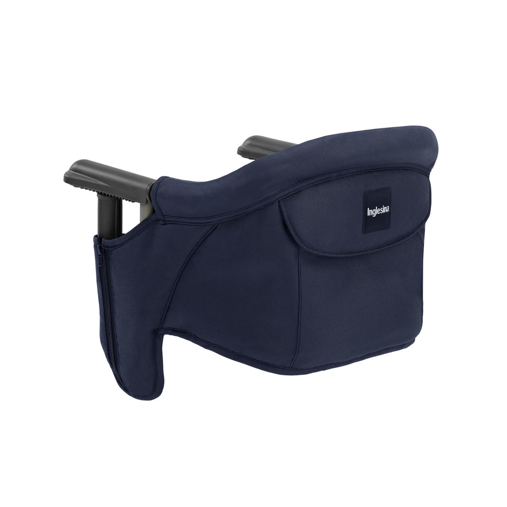 Inglesina Fast Table Chair Navy folded for compact travel and easy storage.