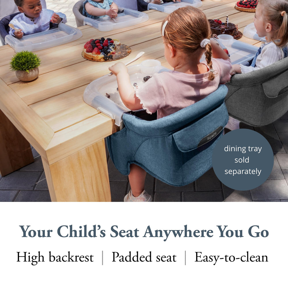 Inglesina Fast Table Chair attached to a table showing secure seating during meals