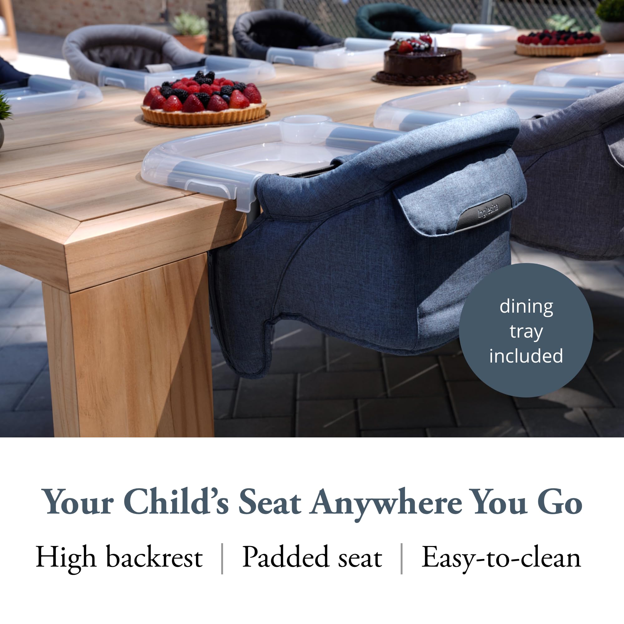 Inglesina Fast Table Chair with dining tray attached supporting mess-free family meals.