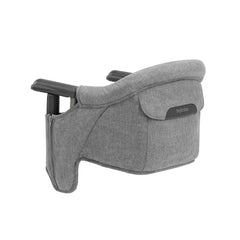 Inglesina Fast Table Chair stone gray melange folded beside travel bag for easy on-the-go meals