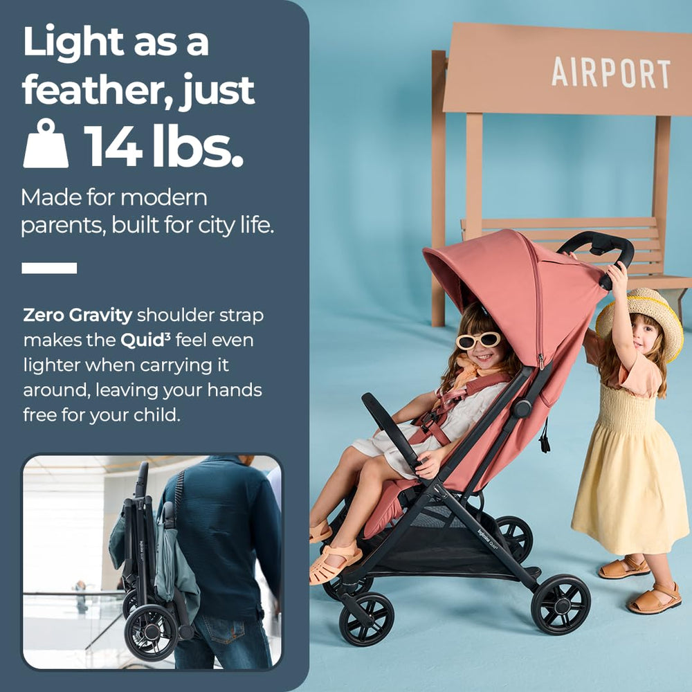 Inglesina Quid³ front wheels with suspension for smooth city rides.
