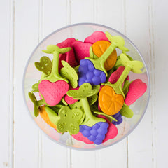 Innobaby Teethin EZ Grip Apple teether in hands shows easy grip.