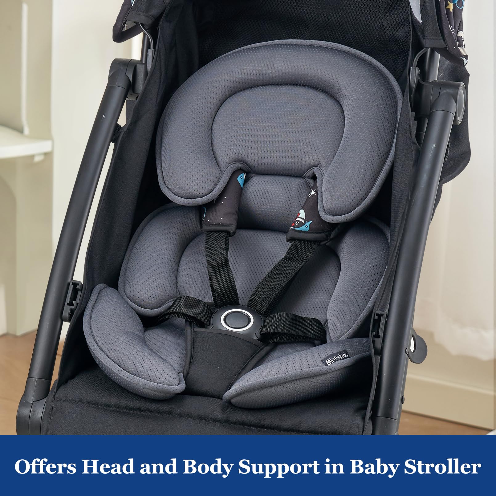 Innokids grey cushion adds calm, stylish travel-ready support.