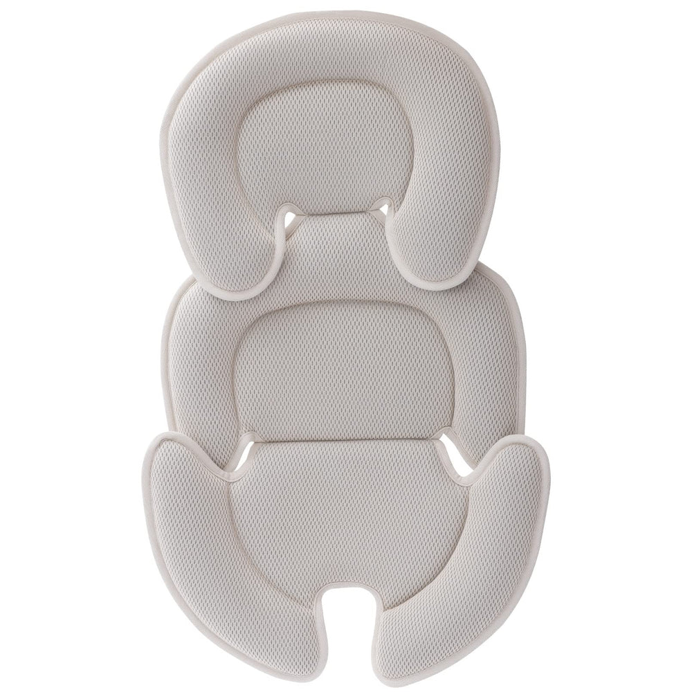 Innokids beige head and body support pillow for car seats improves newborn comfort.