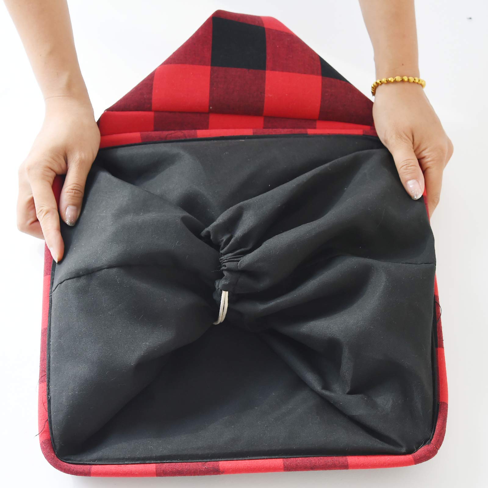 INough buffalo plaid basket open shows roomy interior for gifting.