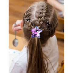 inSowni baby girls hair tie pigtail closeup demonstrates soft stretch and gentle hold.