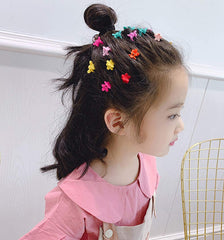 inSowni flower mini clips worn in hair provide gentle grip