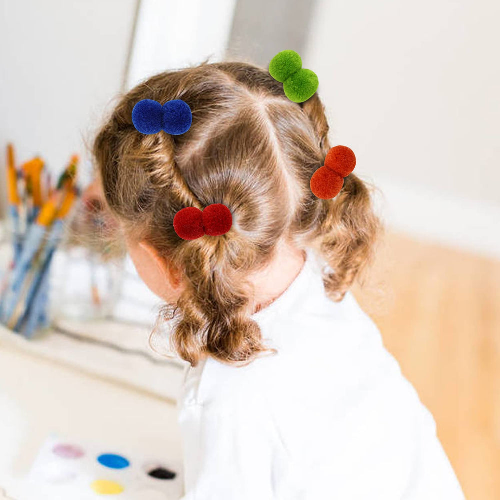 inSowni pom pom hair ties closeup showing soft lint fibers and vivid color