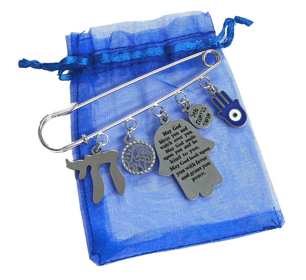 InspiJ safety pin close-up showing the Chai life charm symbolizing life.