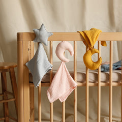 insular baby lovey star moon pink closeup shows soft breathable fabric.