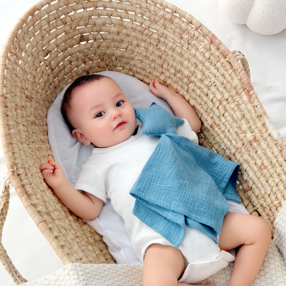 insular baby lovey star moon pink on bed encourages cuddly night-time soothing.