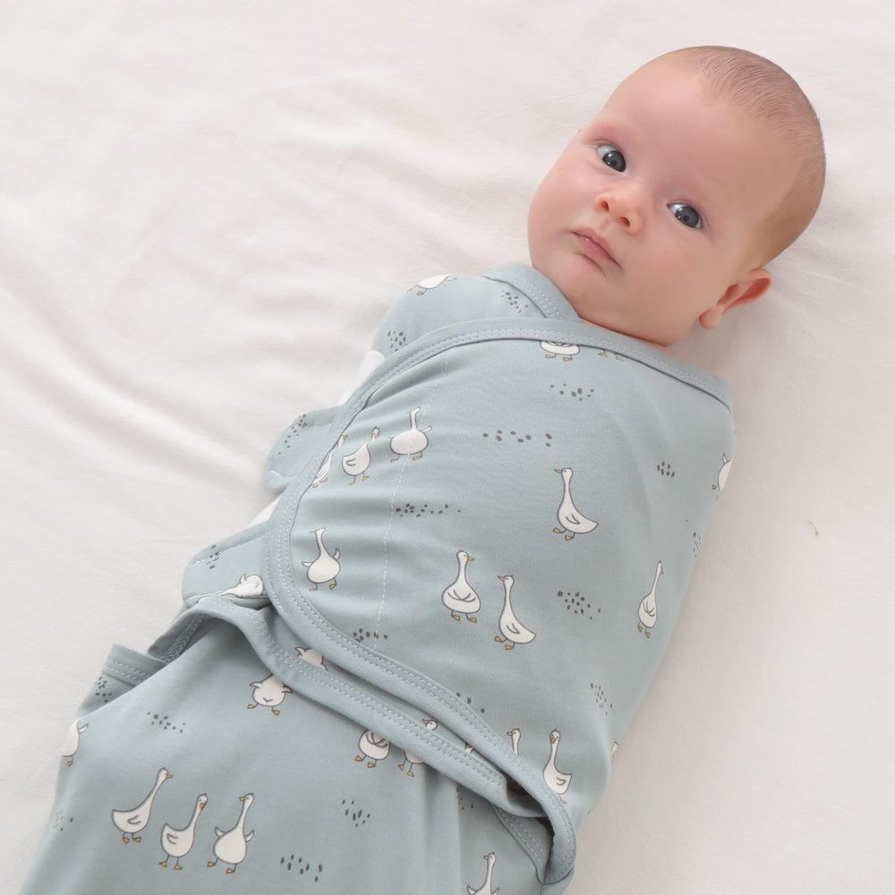 insular swaddle-wrap pattern variety shown as a thoughtful gift option
