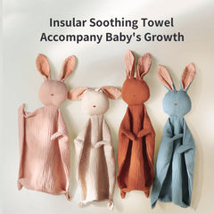 insular Bunny Lovey Blanket soft organic muslin held by baby for comfort.