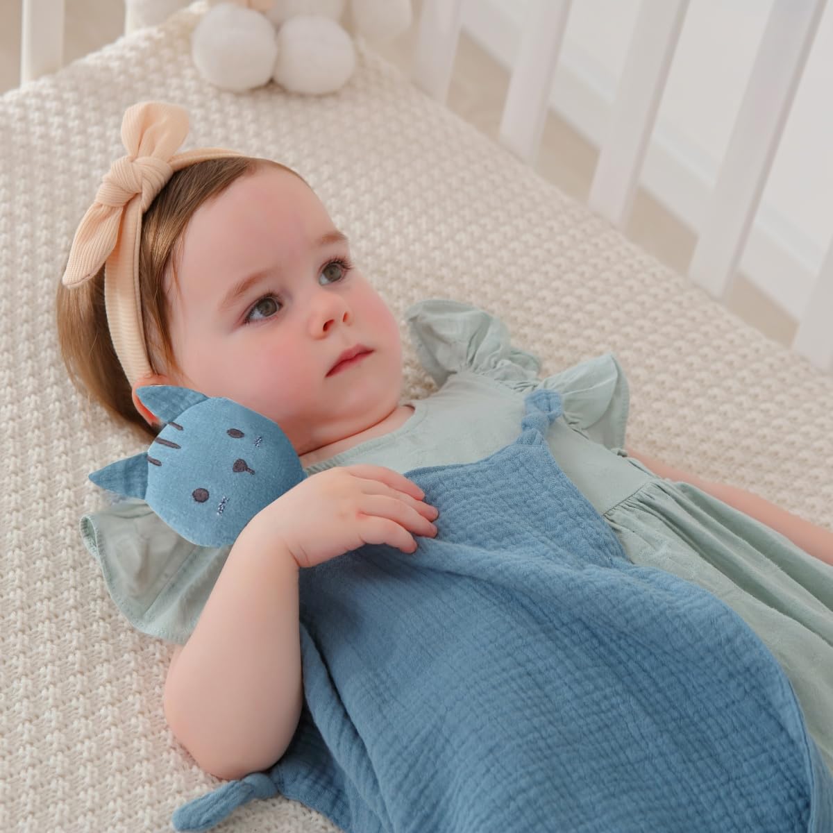 Insular Lovey embroidered eyes: safe design without choking hazards.