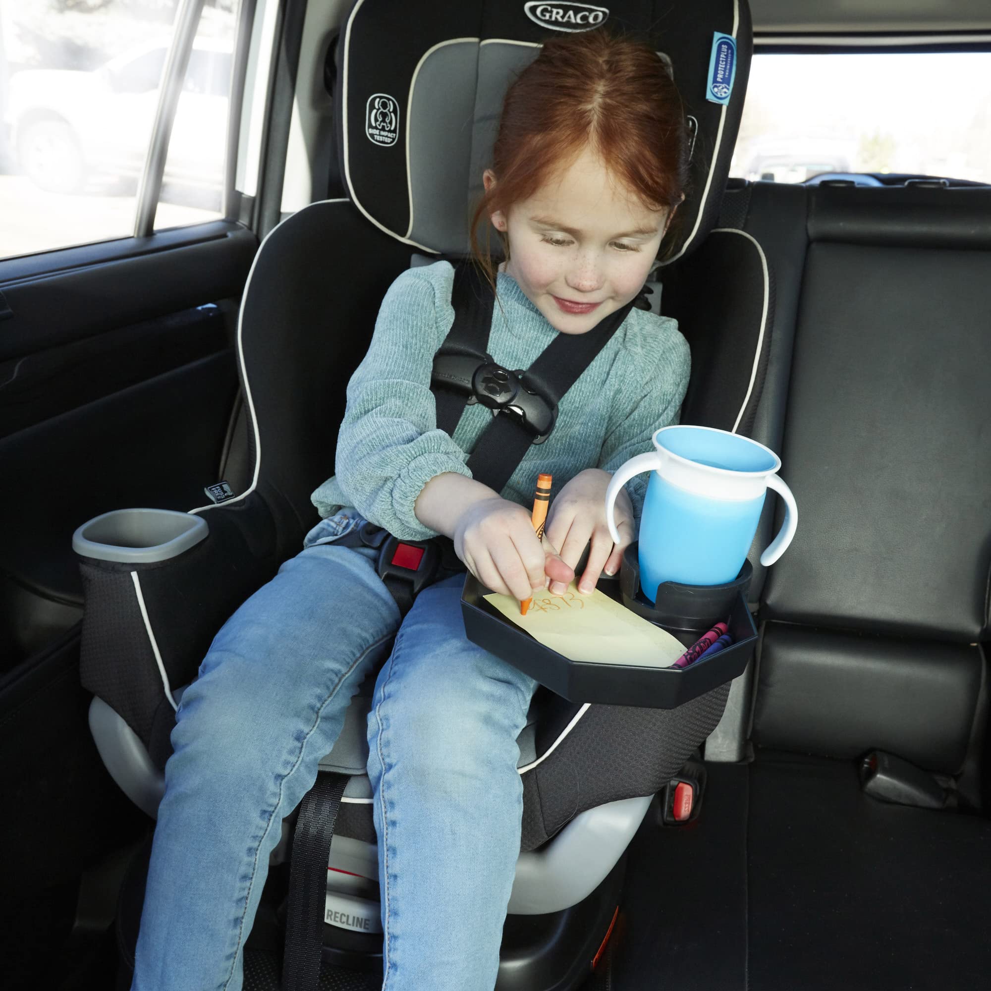 Integral Kids Travel Tray universal-fit cup holder securely holds drinks during travel