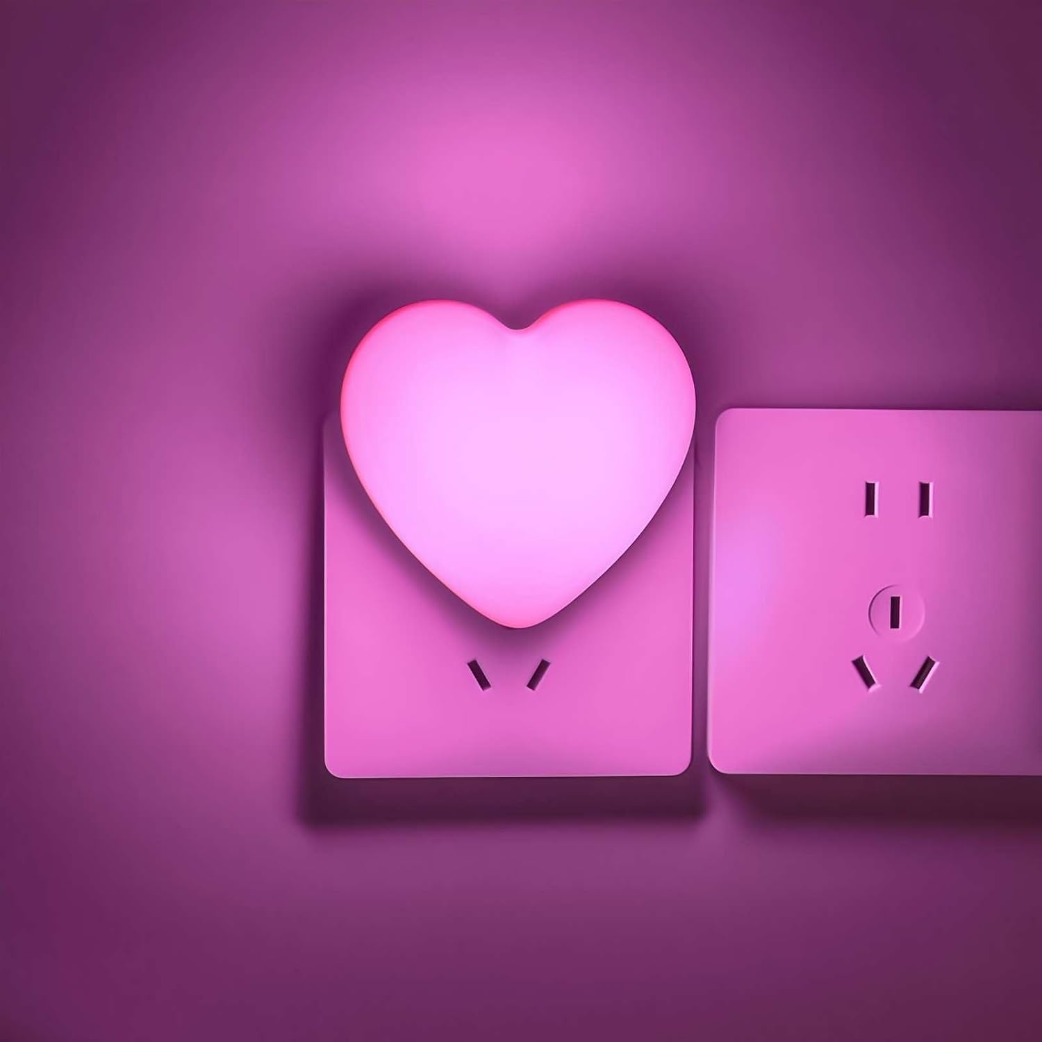 INZU Night Light plugged into outlet shows soft ambient illumination for nursery
