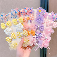 IPEWOEF mini hair bows flower clip close-up showing soft fabric and pearl accents for baby styling.