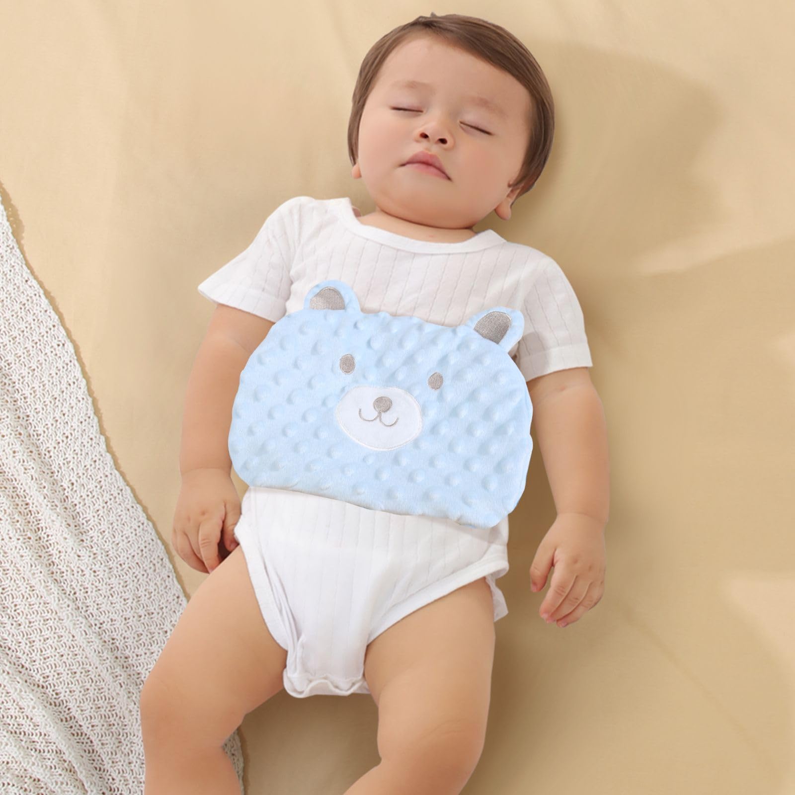 ISANPAN baby tummy wrap in blue ready for use during quiet time.