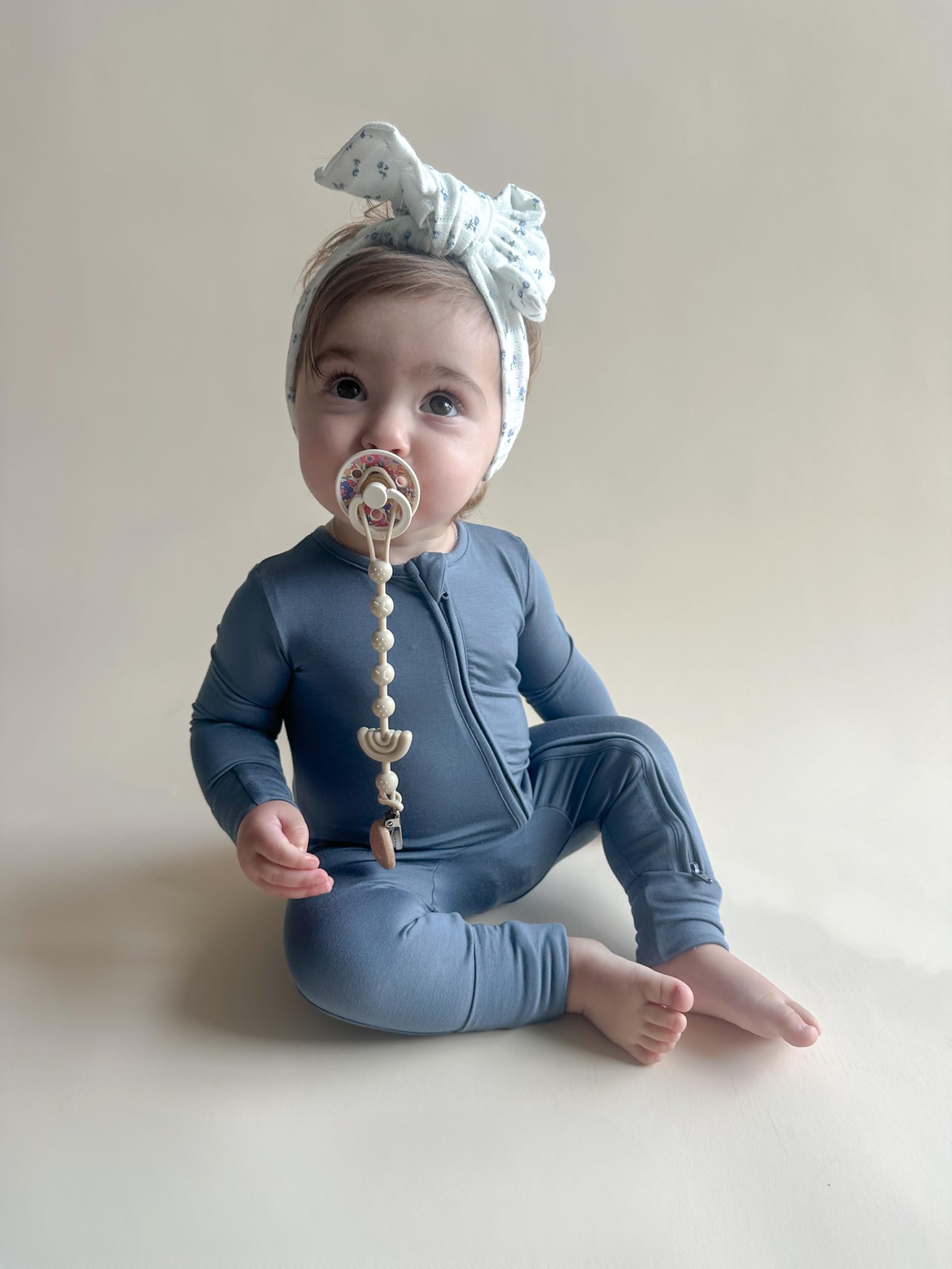 ITSY BITSY BOUTIQUE grow-with-me footed sleeper shown as versatile day-to-night wear.