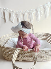 Itsy Bitsy Boutique grow-with-me design shows convertible sleeper transitioning from nap-ready to daytime wear.
