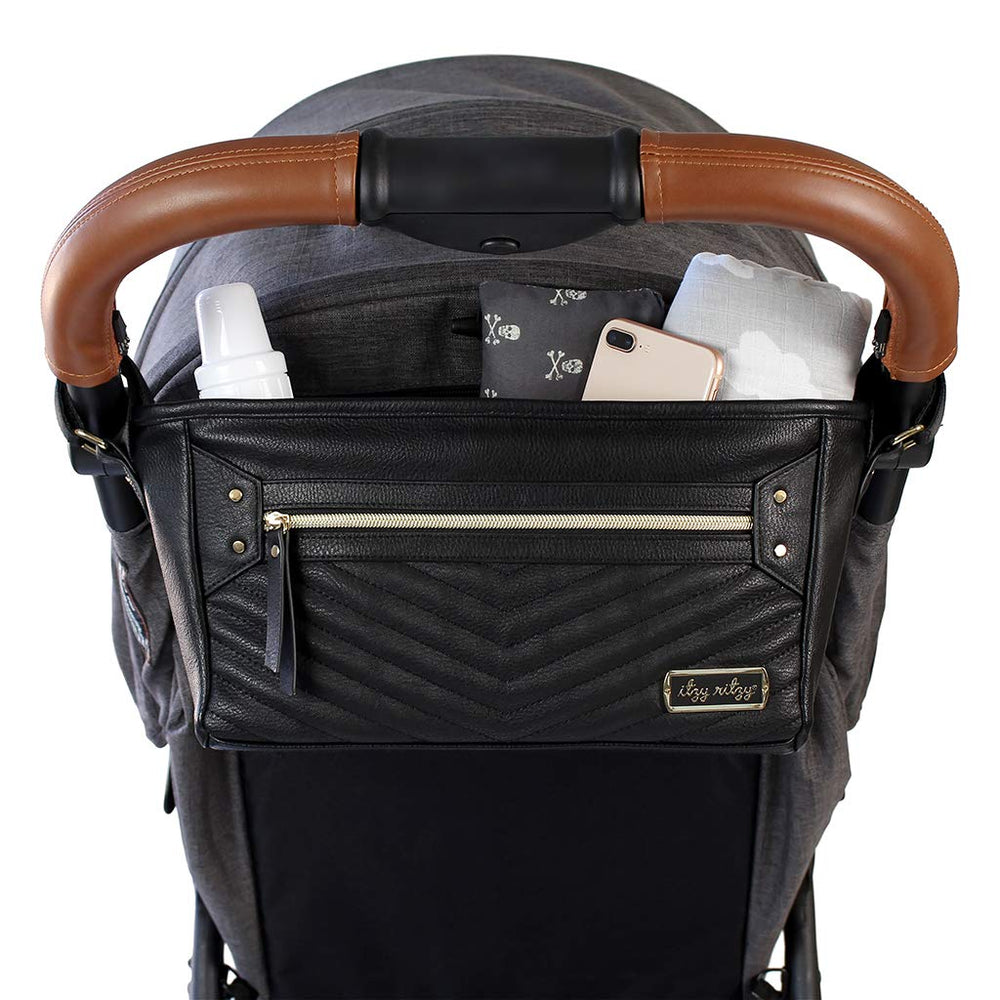 Itzy Ritzy adjustable stroller caddy front-pocket keeps phone within reach during walks.