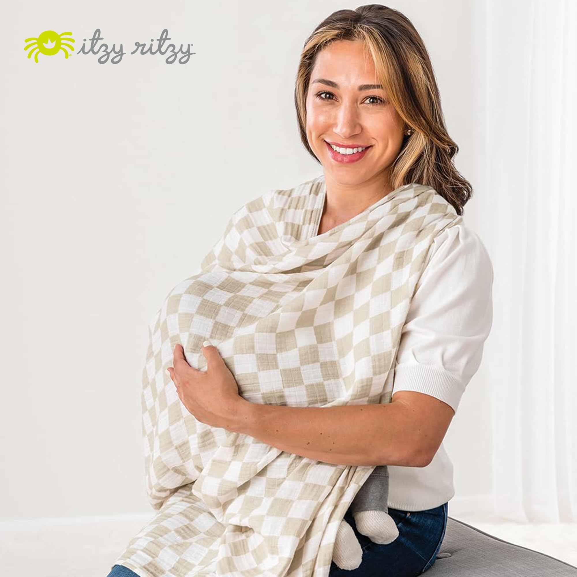 Itzy Ritzy Breastfeeding Boss cover provides ample 47x47-inch coverage for mom and baby.