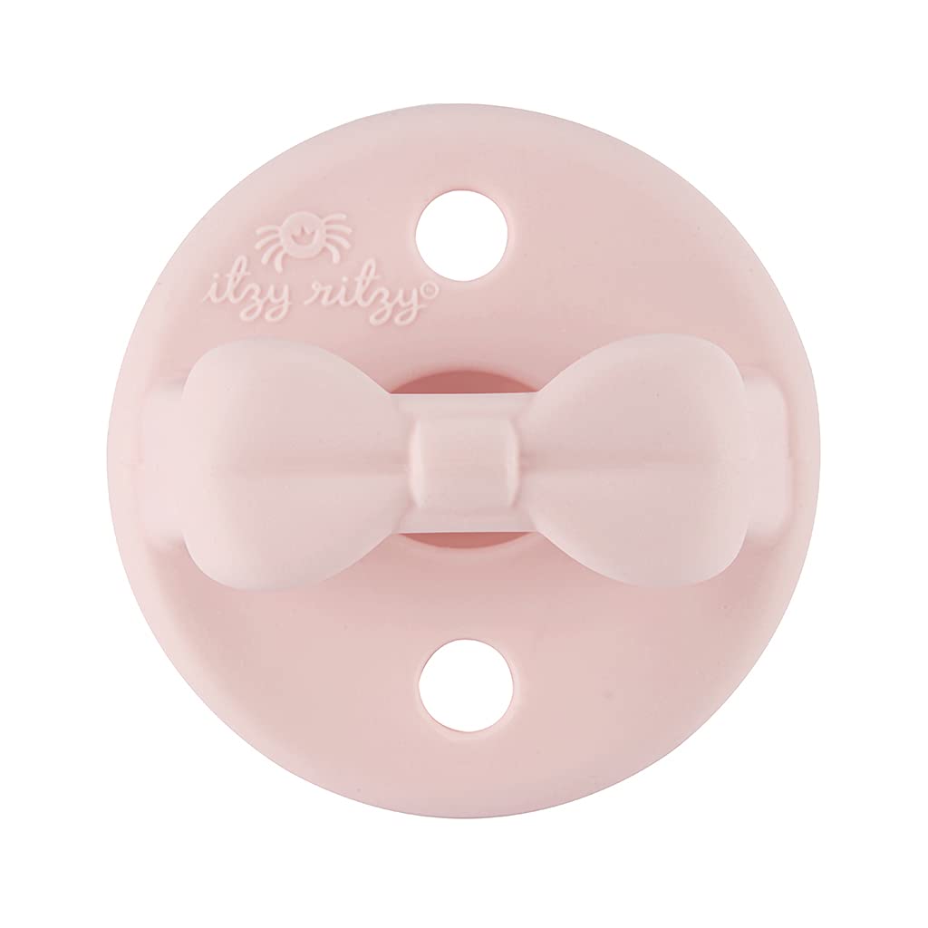 Itzy Ritzy collapsible-handle close-up shows secure grip and design detail.