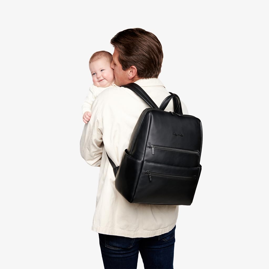 Itzy Ritzy Eras Diaper Bag Backpack opened showing 15 pockets for organized essentials.