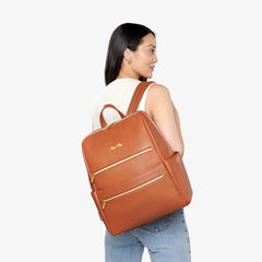 Itzy Ritzy Eras Diaper Bag Backpack laptop pocket fits up to 15 inches for work mode.