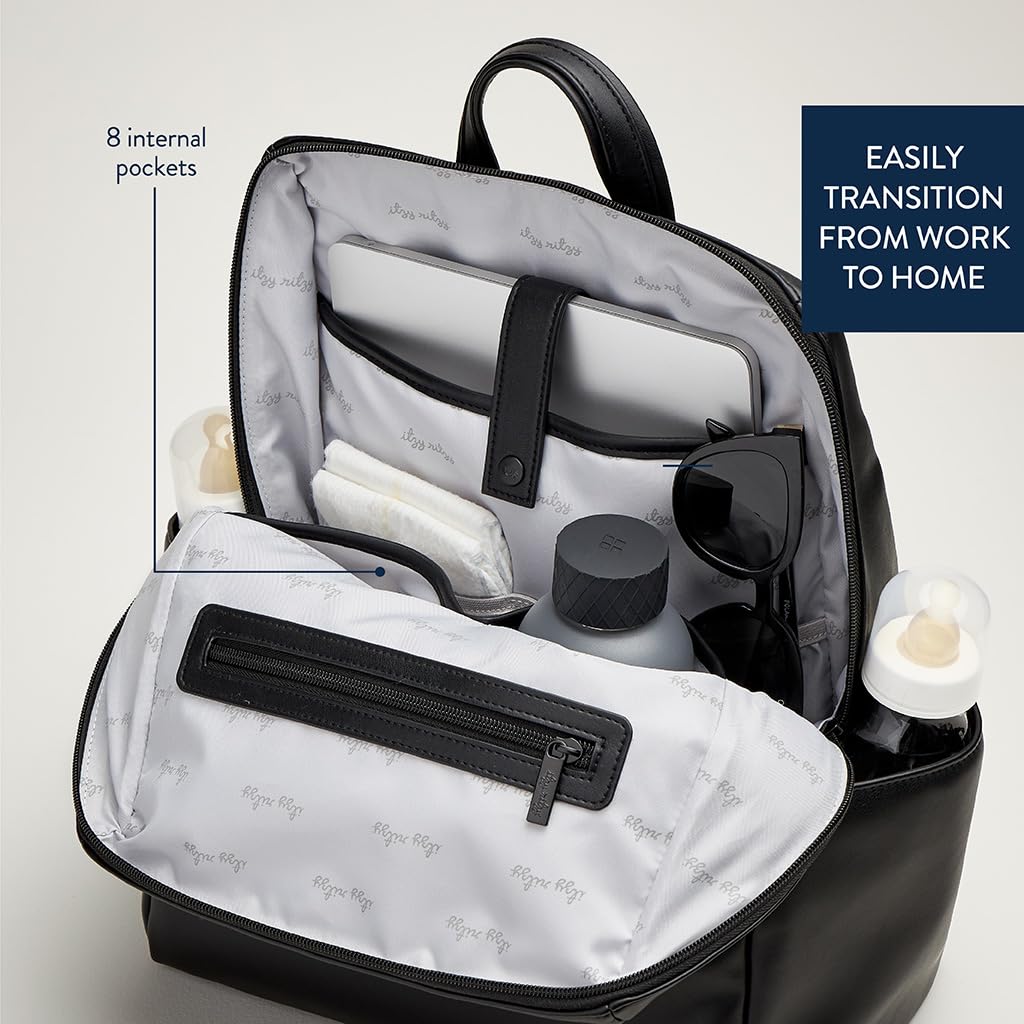 Itzy Ritzy Eras Diaper Bag Backpack trolley sleeve simplifies travel.