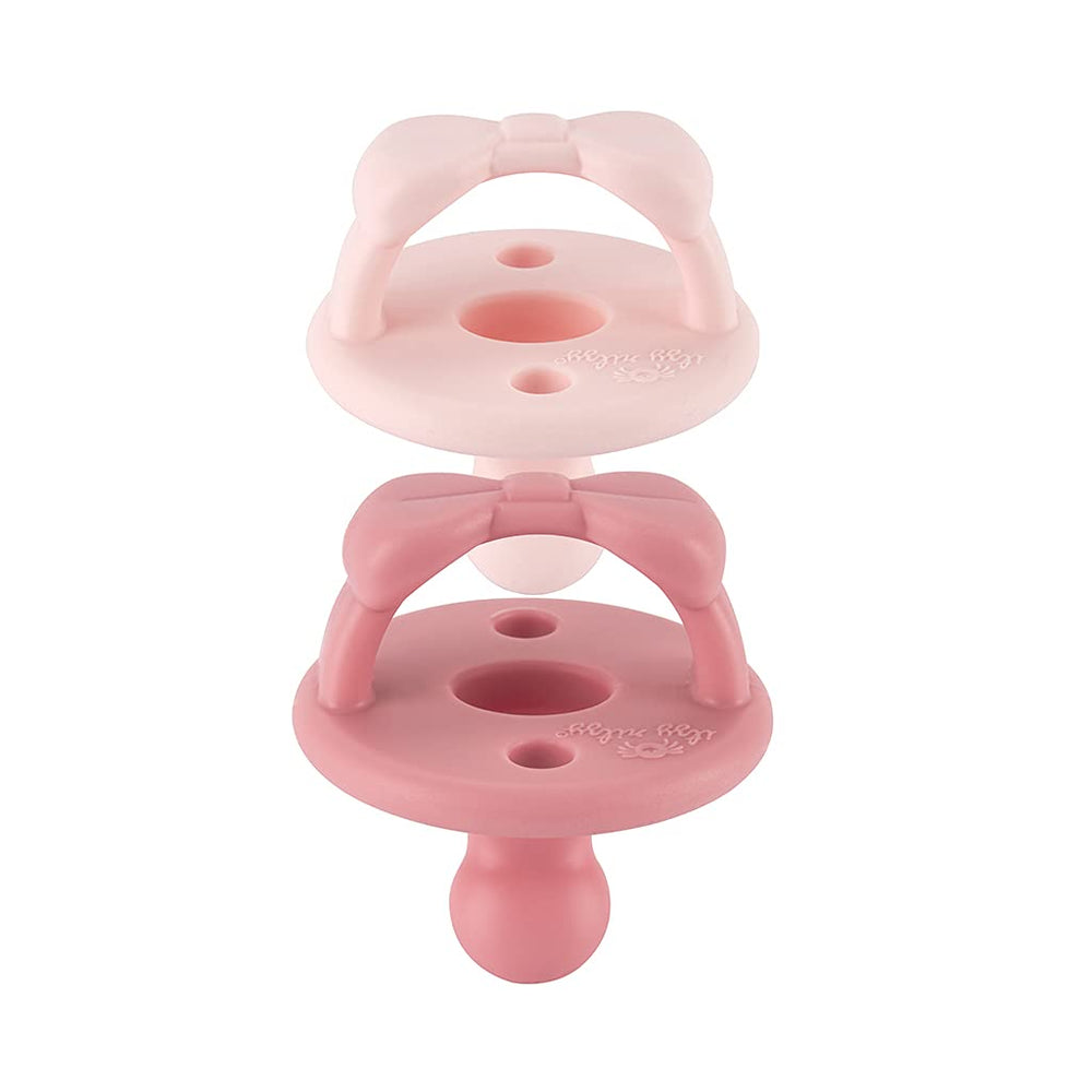 Itzy Ritzy pacifier with two air holes enhances breathability for baby comfort.