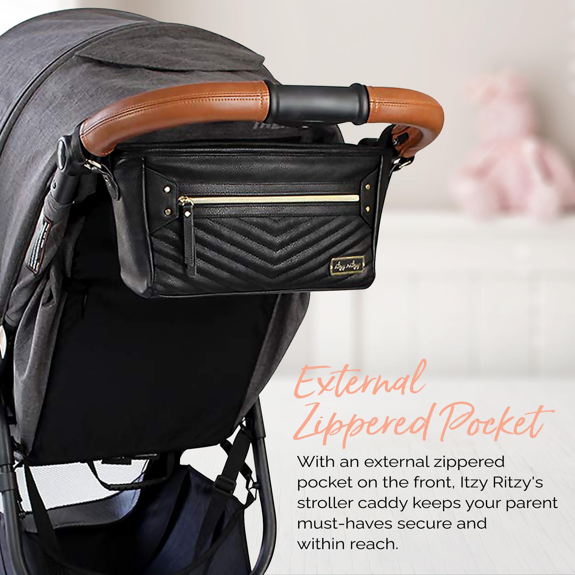 Itzy Ritzy black with gold hardware elevates stroller style on the go.