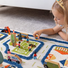 IVI Thick 3D play mat highlights blue roads and buildings for color learning.