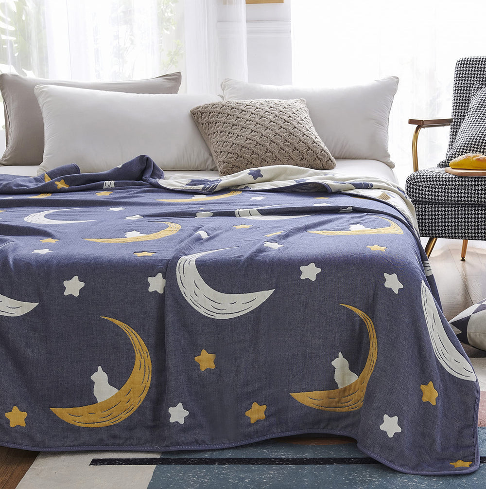 J-pinno Bright Moon Stars travel blanket for car trips and picnics.