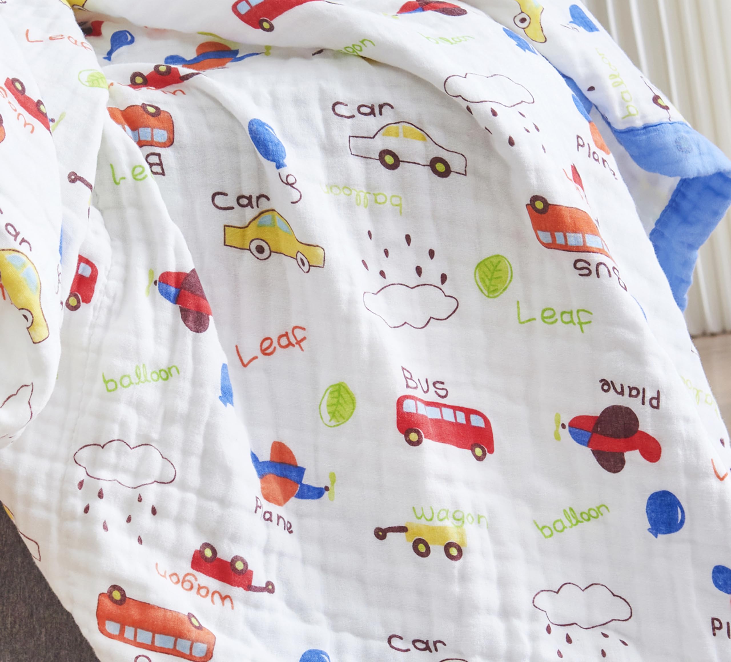 J-pinno Cars Cute Muslin Blanket on crib, breathable comfort for nap times.
