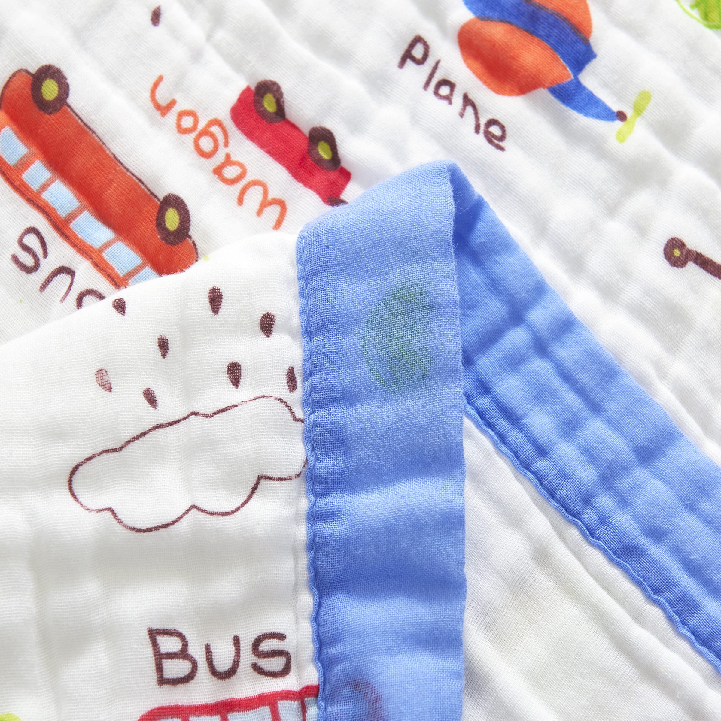 J-pinno Reversible Cars Muslin Blanket showcases versatile styling choices.