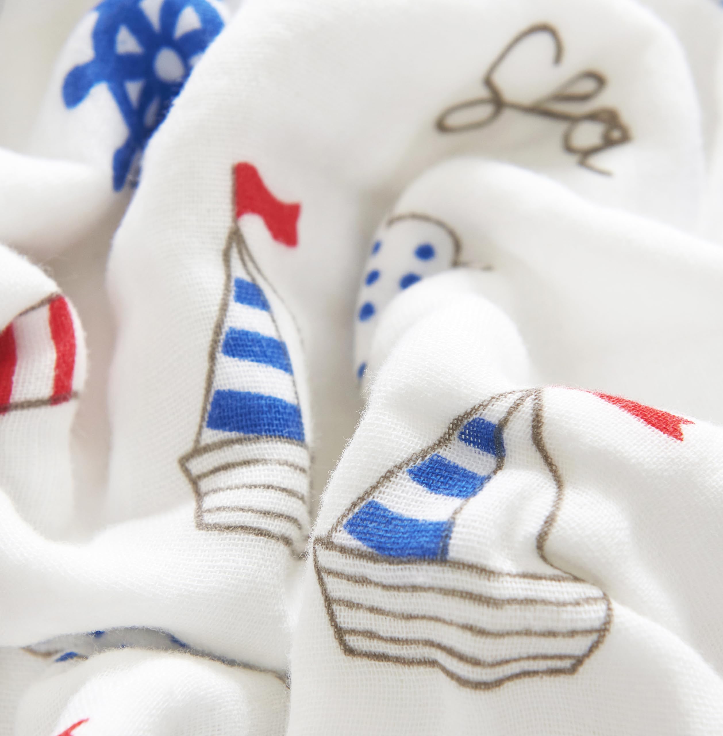 Folded J-pinno Sailboat Sea Adventure blanket highlights plush texture and six-layer muslin
