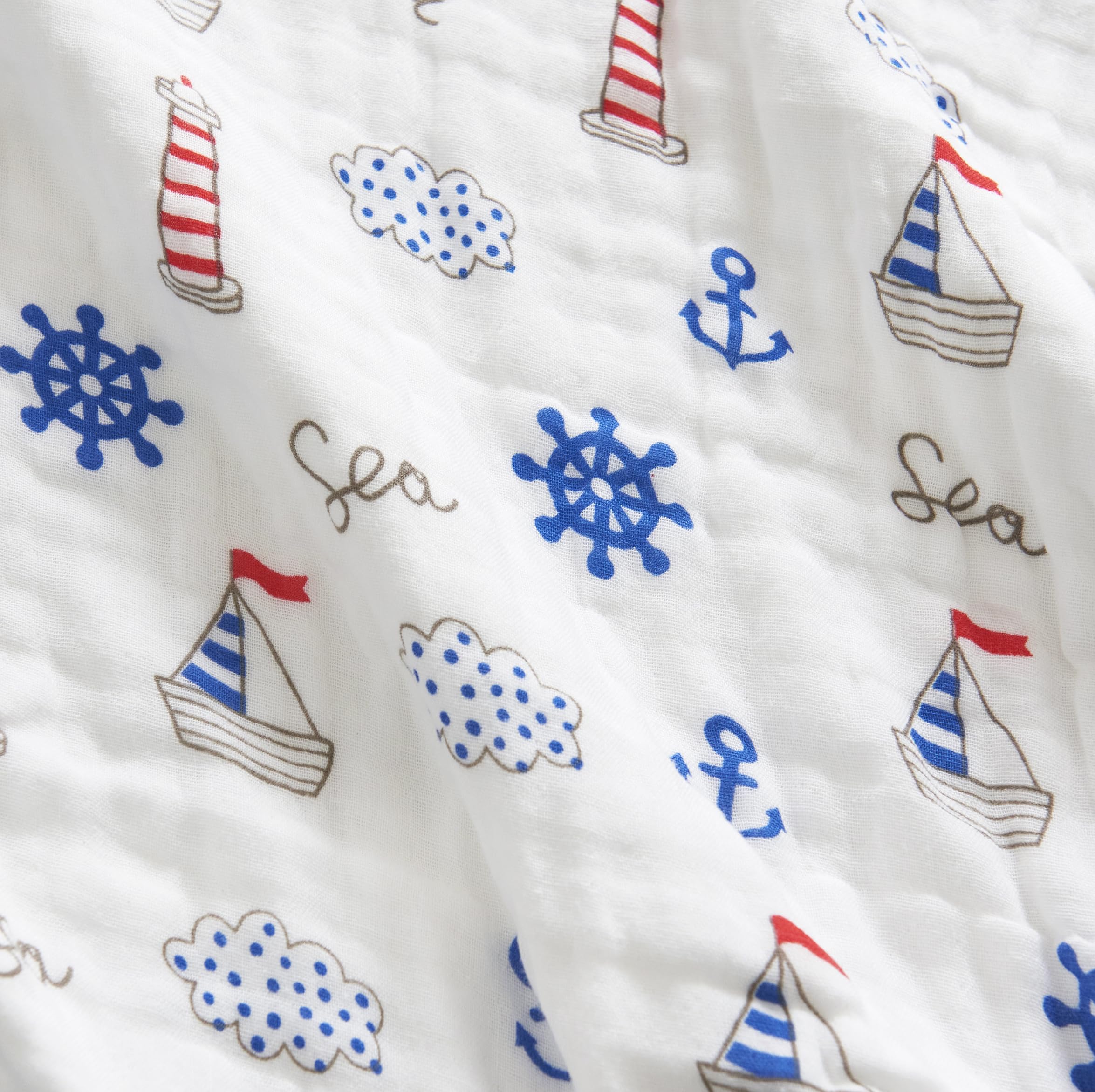 Travel-ready J-pinno Sailboat Sea Adventure blanket as a cozy car throw