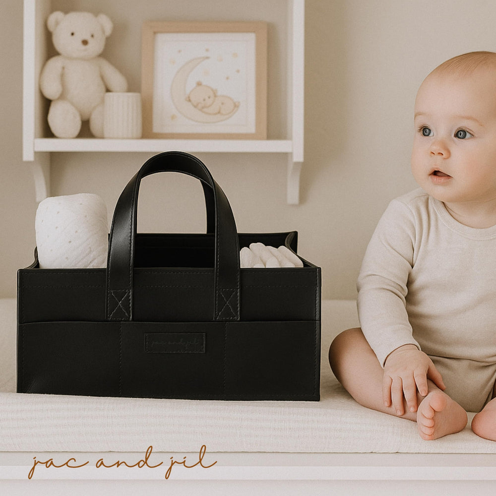 Jac and Jil liquorice-black diaper caddy with damp-wipe surface for quick cleanup