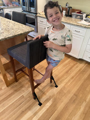 Jackaroo Leg Classic used on a highchair during meals for stability.