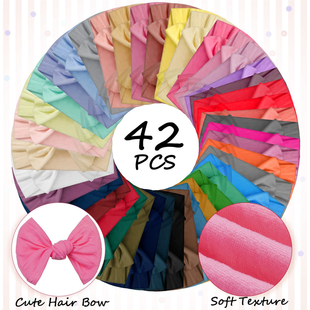 Janinka 4-inch bow headbands frame tiny smiles with a classic, cute knot.
