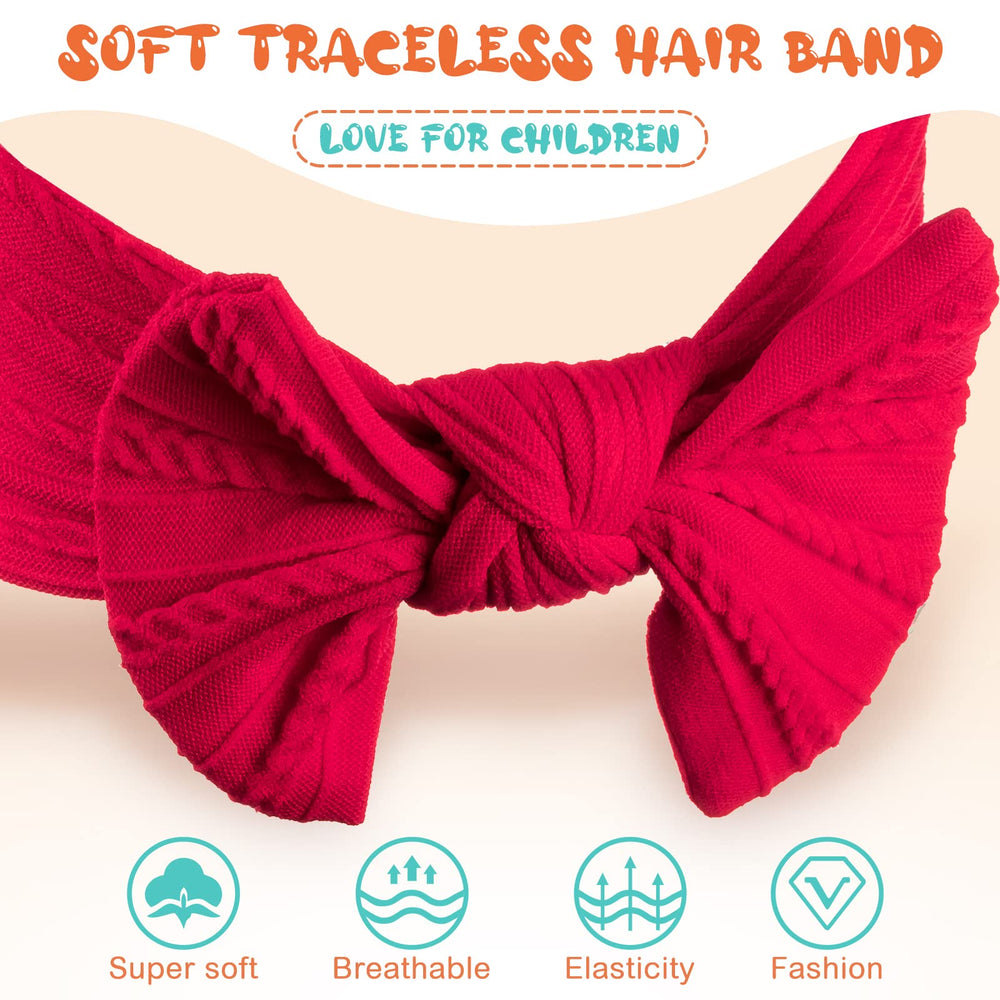 Janinka bows with jacquard texture on a secure elastic band for stay-put wear.