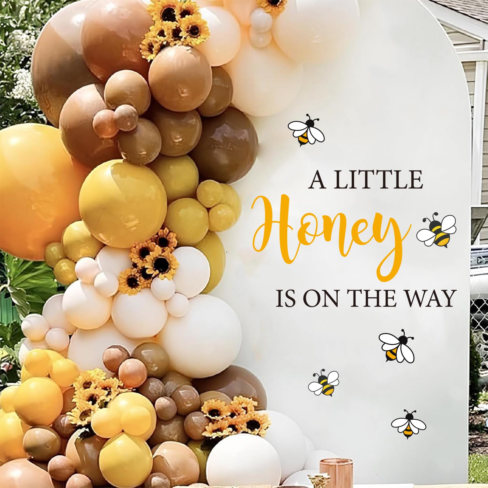 JarThenaAMCS bee design wall art adds whimsy while serving as a charming backdrop.