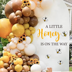 JarThenaAMCS bee design wall art adds whimsy while serving as a charming backdrop.