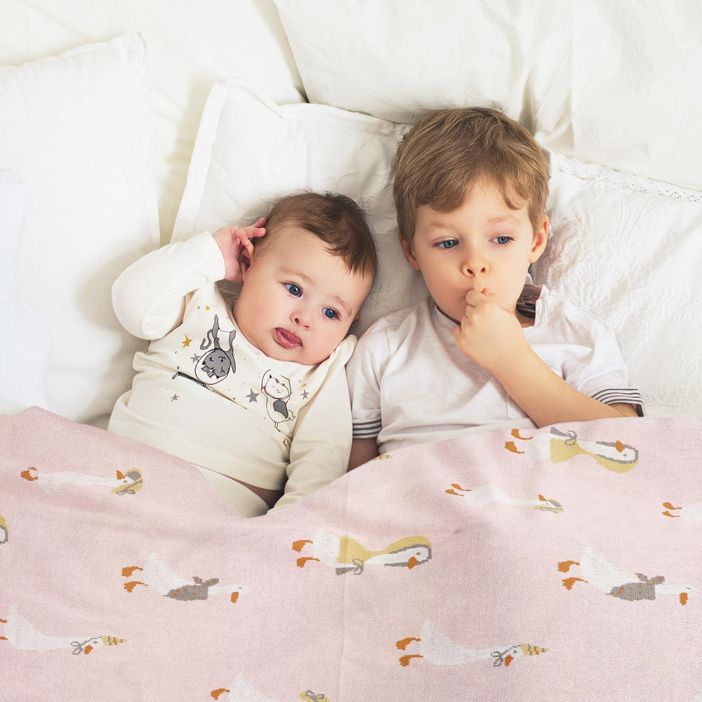 JarThenaAMCS versatile baby blanket in pink goose design for daily use and travel.