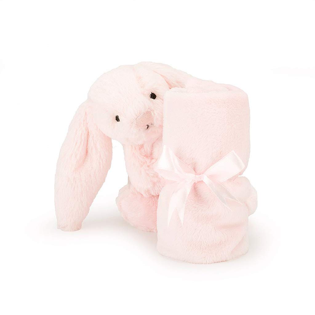 Jellycat Bashful Pink Bunny Soother on bed demonstrates cozy bedtime comfort.