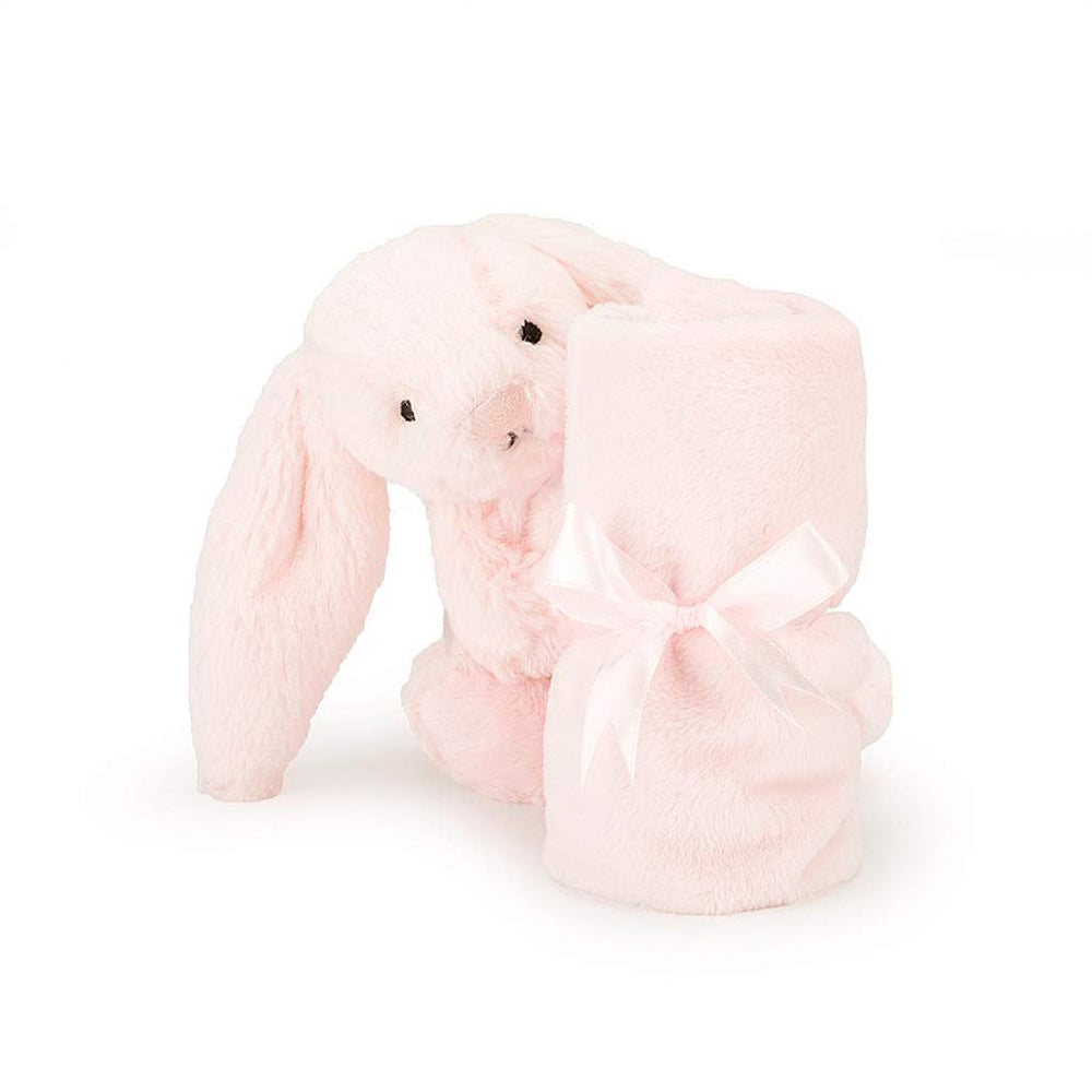 Jellycat Bashful Pink Bunny Soother on bed demonstrates cozy bedtime comfort.