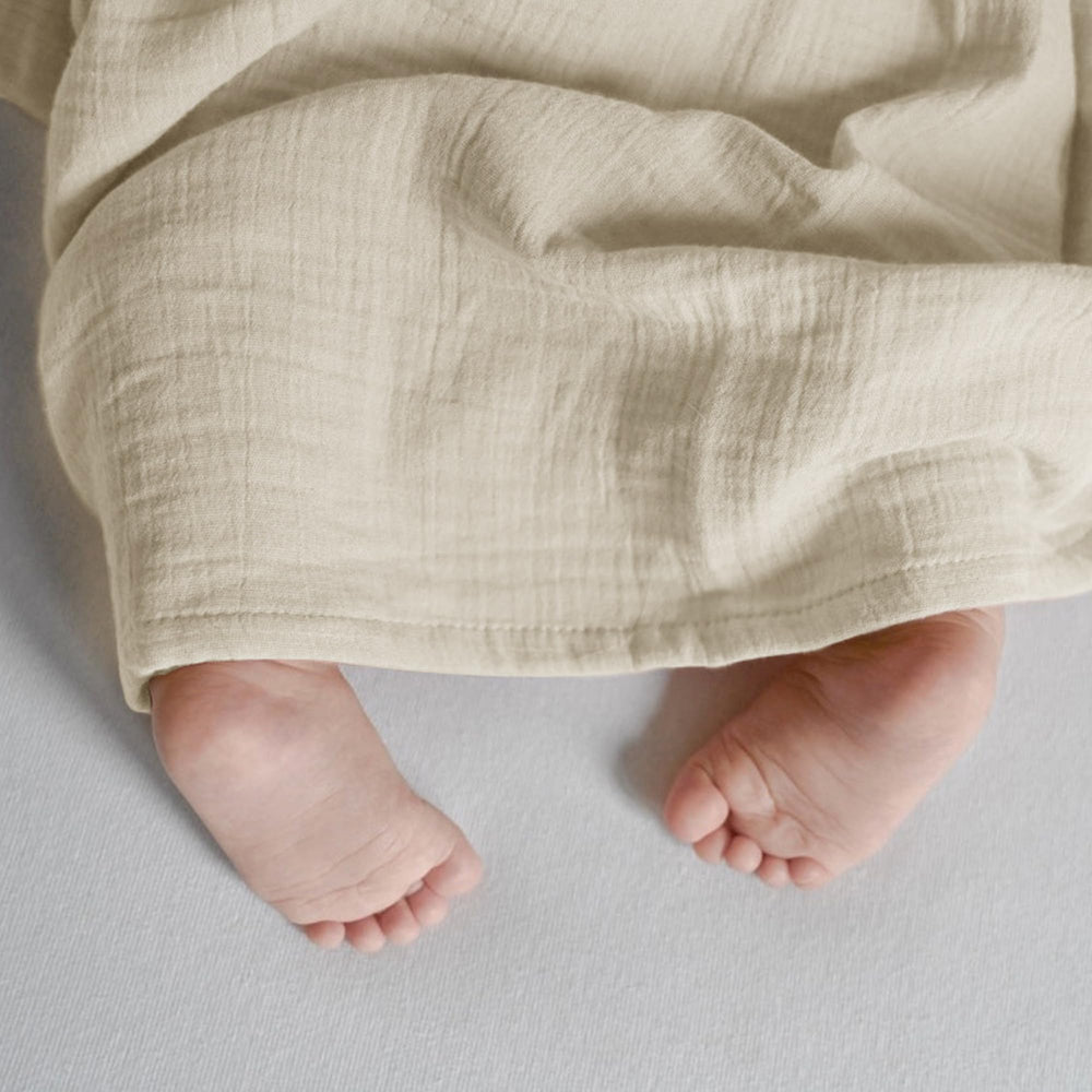 JELLYMONI Muslin Swaddle Blanket breathable-fabric image emphasizes airflow to prevent overheating.